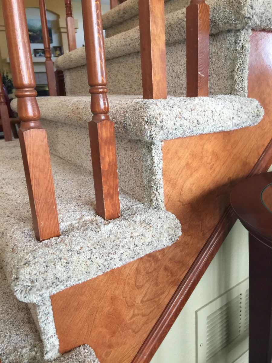 Upholstered nose and Wrap over, between balusters